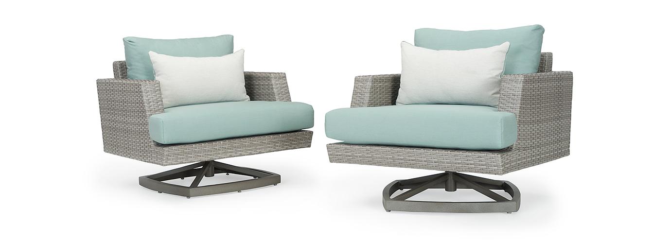 two outside patio chairs with white cushions